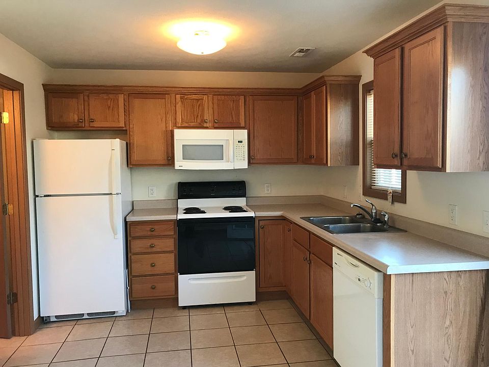 Eat-in kitchen includes microwave above range, dishwasher an