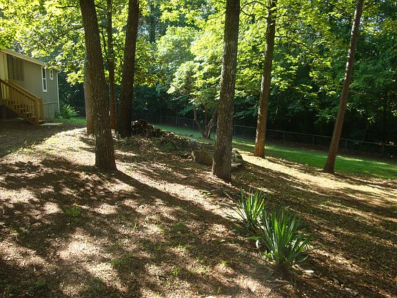 large back yard with fence