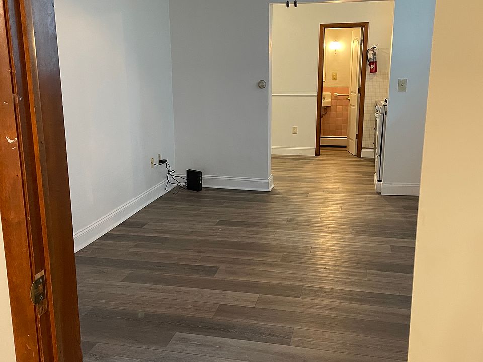 Living room and kitchen view from bedroom