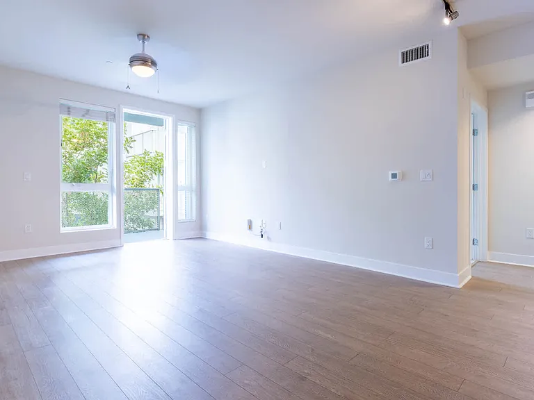 Living Room with Balcony and Hard Surface Flooring