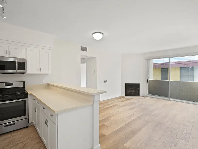 Open-Concept Kitchen, Dining, and Living Room Areas