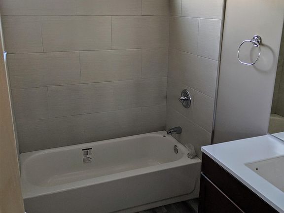 Main bathroom with shower & tub. Every detail newly remodeled.