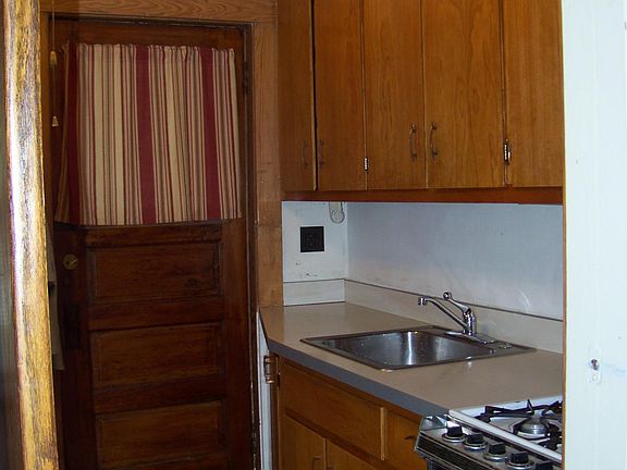 Lots of cabinets in the kitchen.
