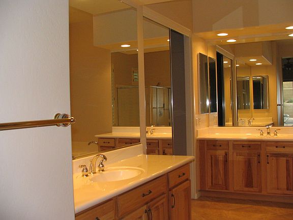 Immaculate master bath with lots of storage space.