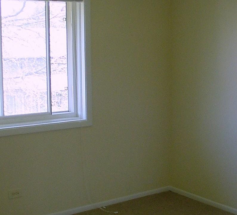 Bedroom. Carpet will be replaced with laminate flooring.