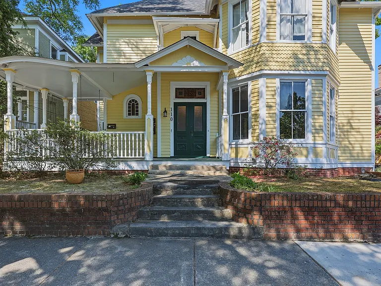 Front of house, apartment is upstairs on the left