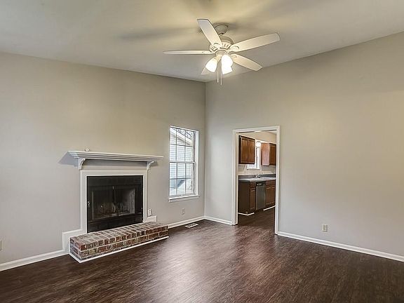 Living room, working fireplace. New laminate floors.