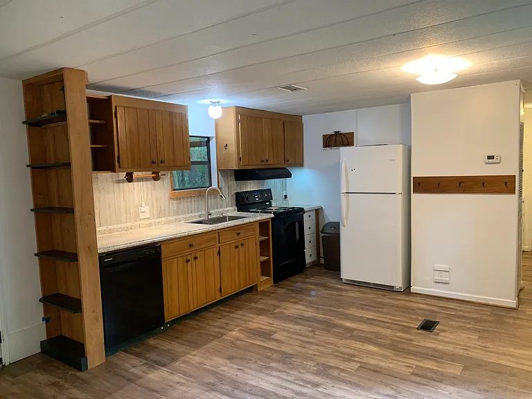 Kitchen with plenty of storage, new sink, dishwasher, etc.