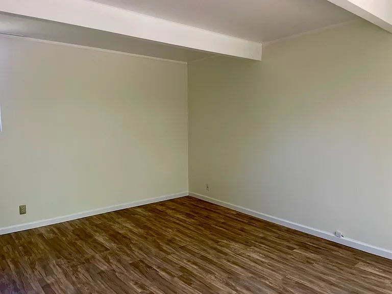Master bedroom with new hardwood flooring