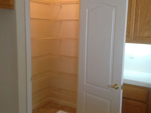 Large Pantry with light fixture.