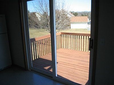 Deck overlooking backyard.