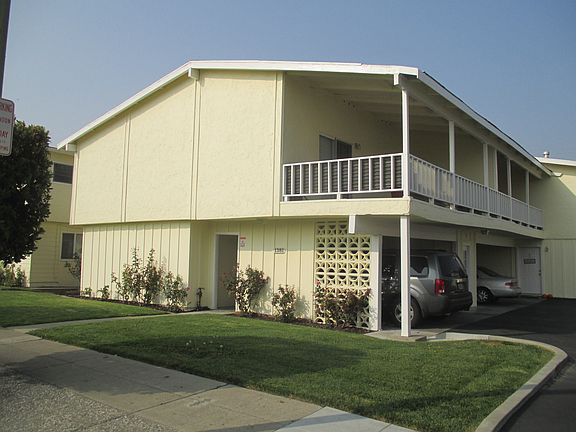 Two stories; 1st story carport parking