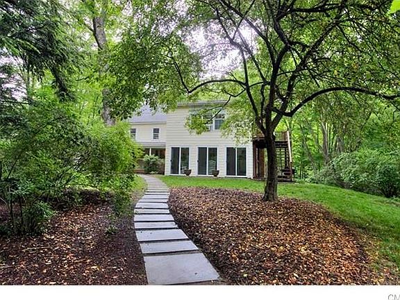 Inviting front walkway leads to front porch