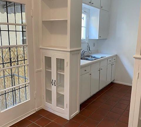 Eat-in nook with glass front shelves