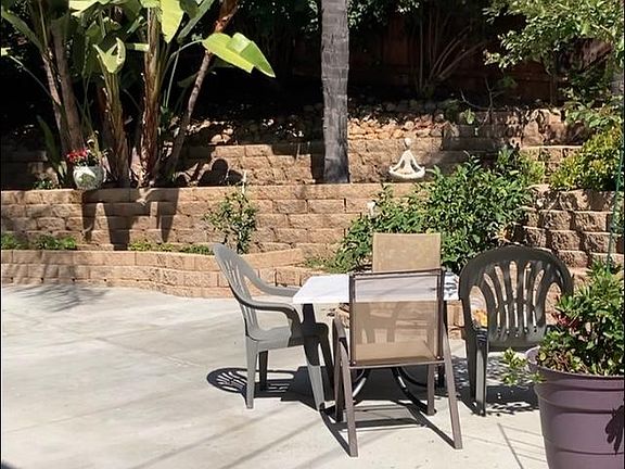 brings you to the very large shared front patio...