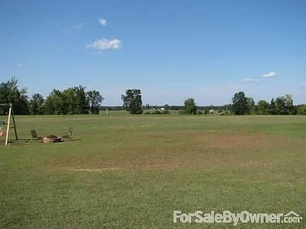 Beautiful Backyard View
						:
						Additional 2-4 acres available for purchase