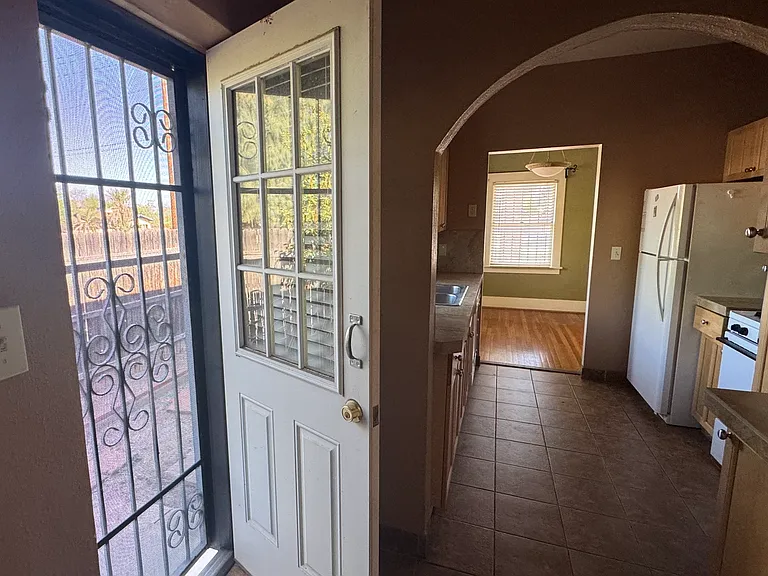kitchen and side door, with dining room in background