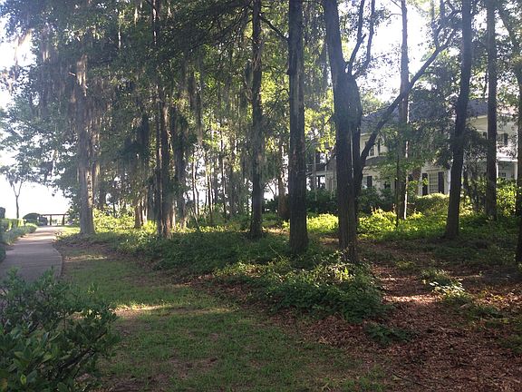 Lot is right of the walkway