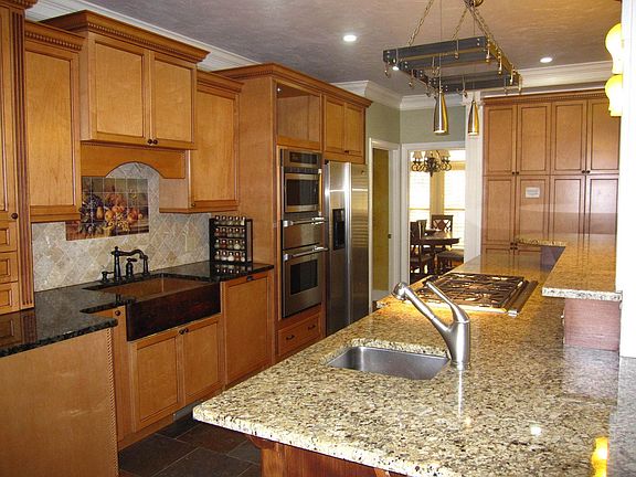 CUSTOM-BUILT Kitchen with EXQUISITE MILLWORK DETAIL!