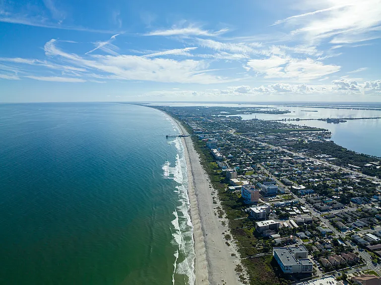 The perfect beach walk: 2.5 miles to Cocoa Beach Pier or .5 miles to Jetty Park.