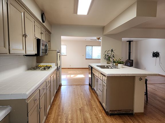 kitchen view from front door - living room on right