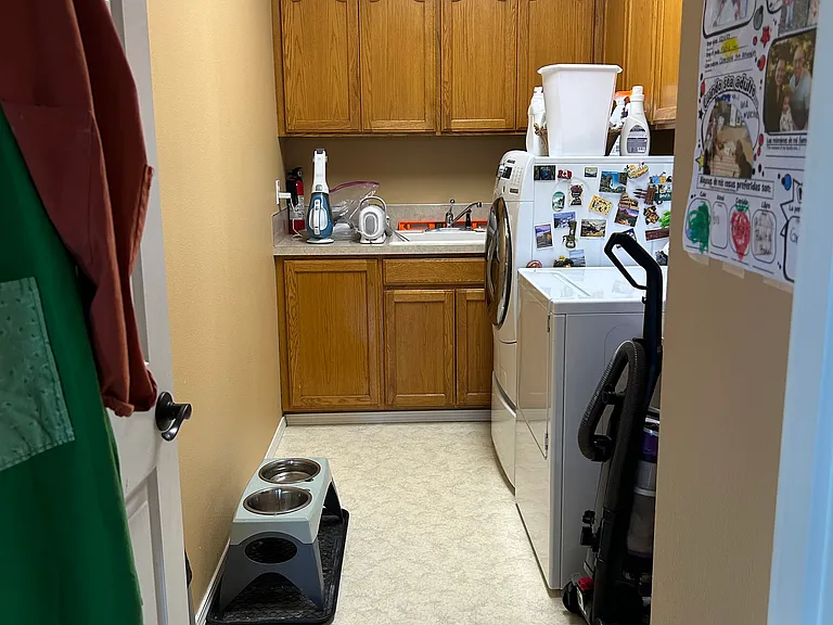 Laundry room off of the kitchen on the main level