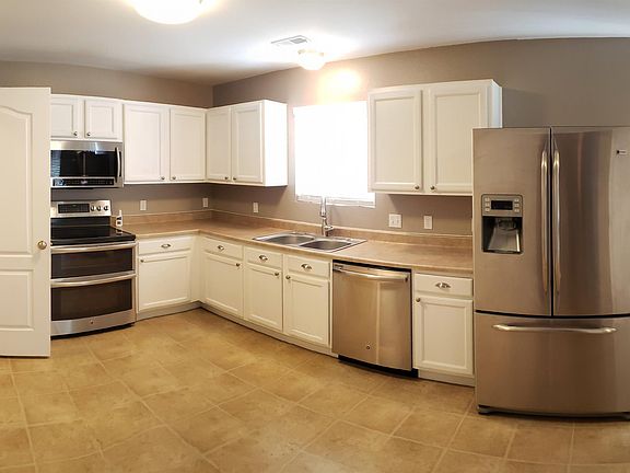 GE Profile Fridge, Dishwasher, & Double oven stove, Pullout Faucet, & new over range microwave.