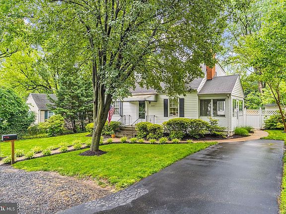 Private driveway and mature landscaping