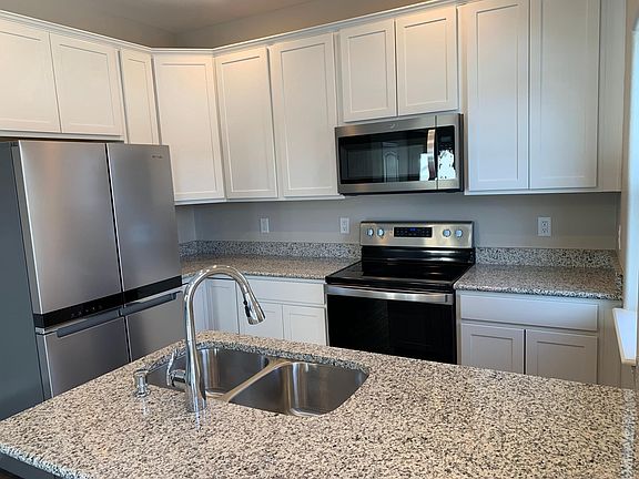Kitchen with Brand-new Stainless Steel Appliances