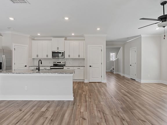 The kitchen overlooks the dining area