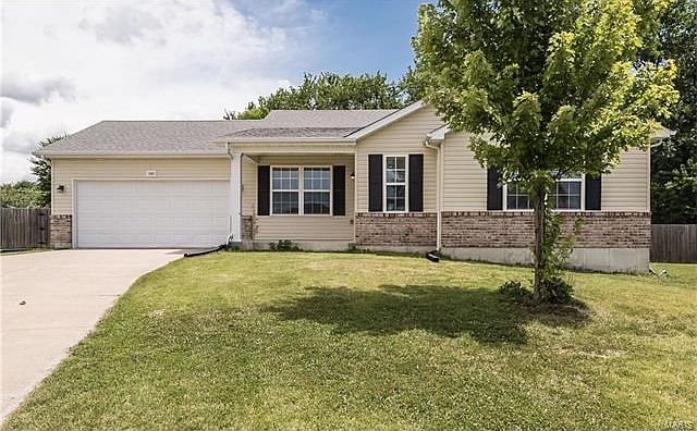 Located in a quiet cul de sac on a large fenced lot.