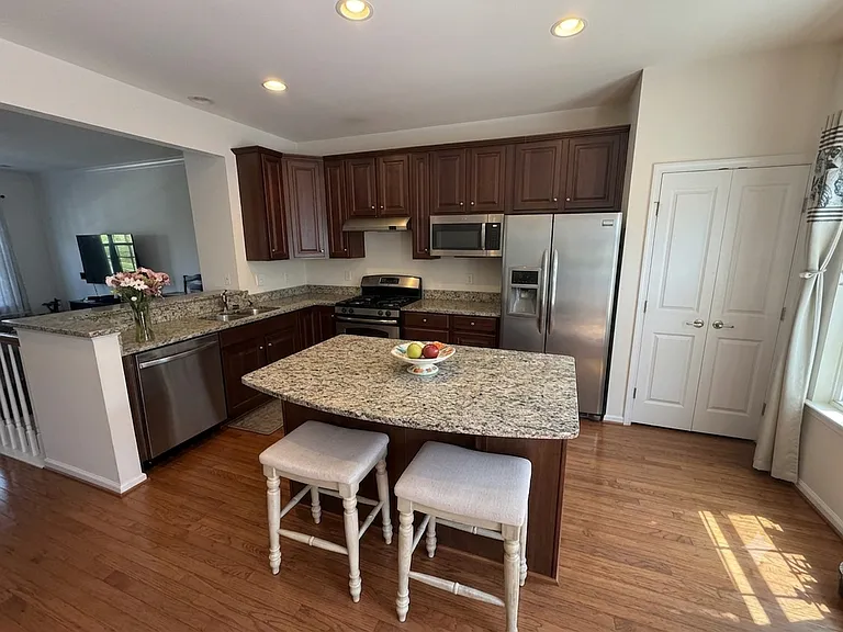 Kitchen with all stainless steel appliances