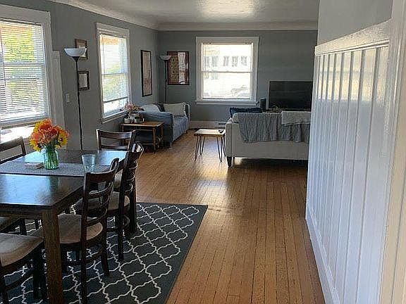 view of living room and dining room from kitchen