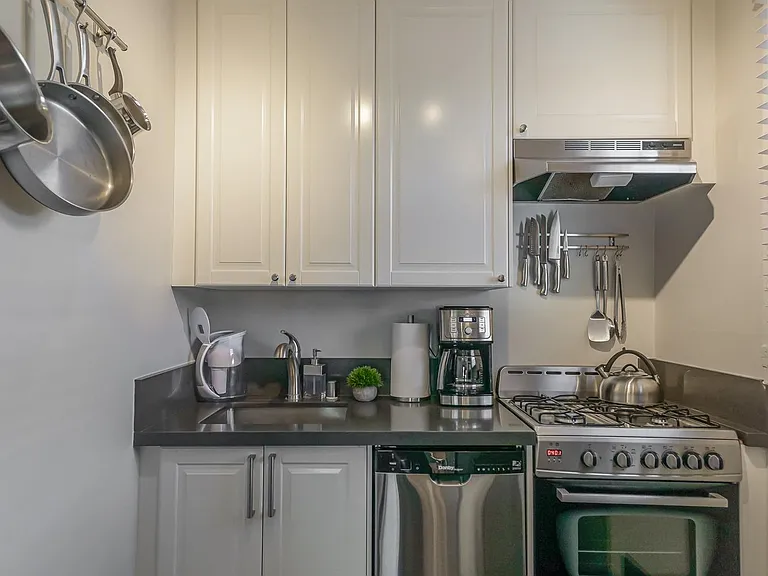 Petite kitchen with appliances