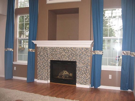 Spacious Living Room w/Gas Fireplace and Entertainment Center