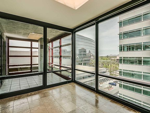 Kitchen and patio intersection with city / mountain views
