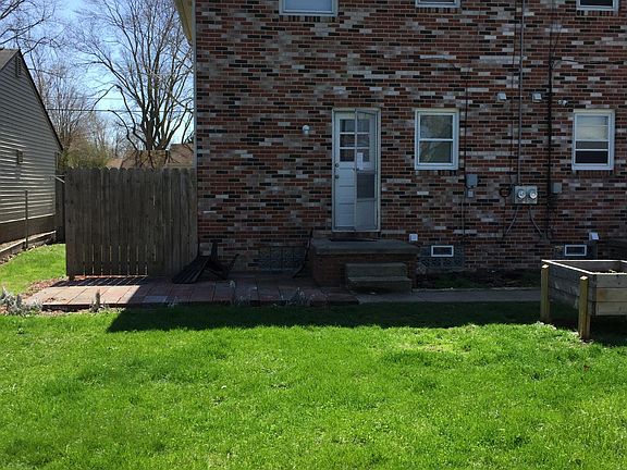 Back with block patio.