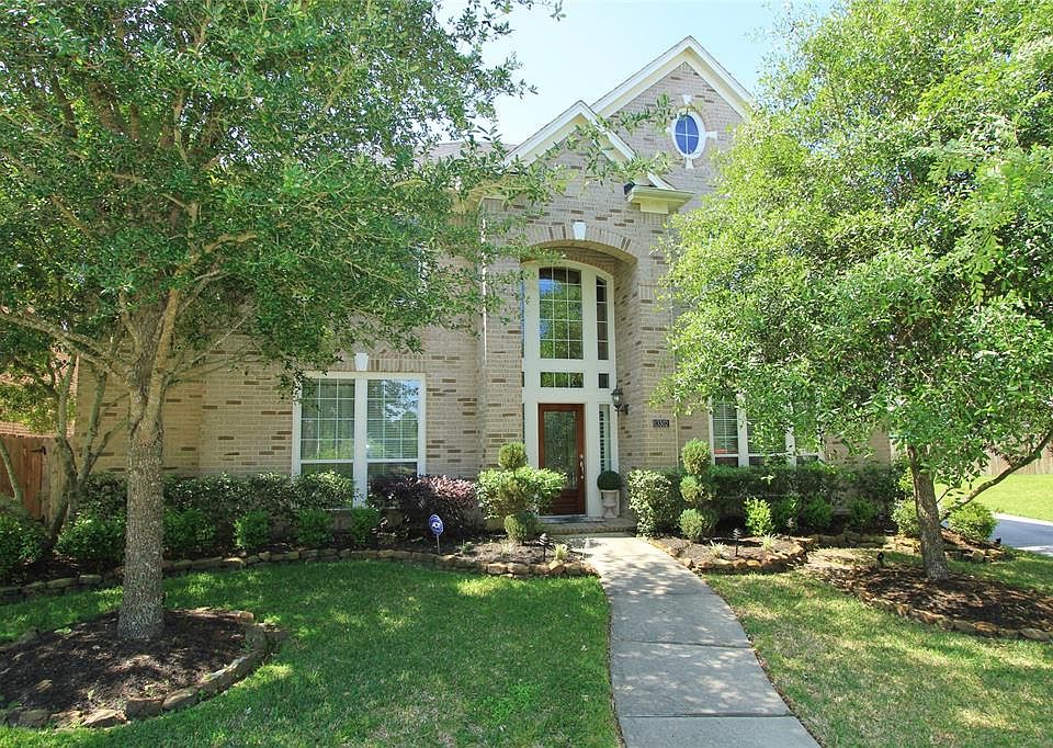 Captivating Two Story, Four Bedroom Home is ideally situated in a cul-de-sac and backs to the community center, park, pool and t