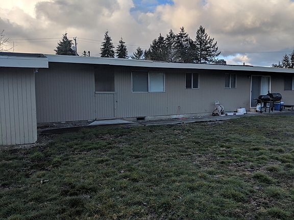 Large backyard with slab patio access