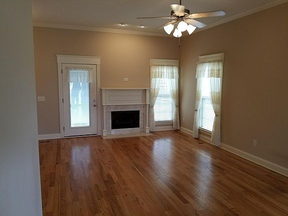 Spacious living room with a gas fireplace.