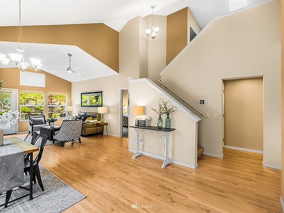 As you step into the home you see the living area, including formal dining room, to your left, with the kitchen to your right. 