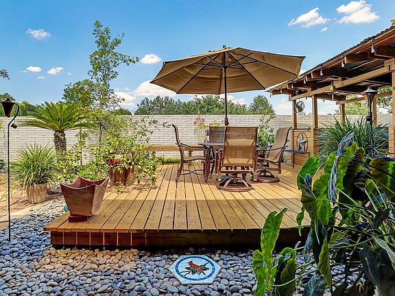 Beautiful custom made deck makes this home truly unique and beyond breathtaking!