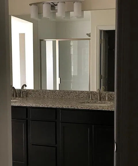 Double under mount sinks in the master bathroom for easier cleaning