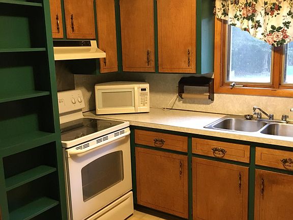 kitchen with dishwasher and microwave