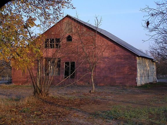 huge barn to left of house