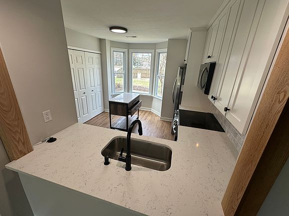 Breakfast bar looking into kitchen