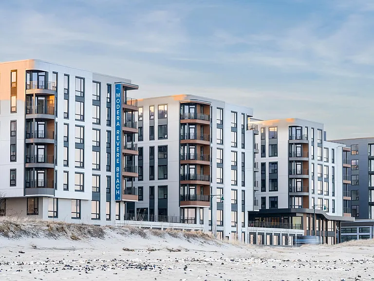 A striking coastal community with modern design set along the shoreline.