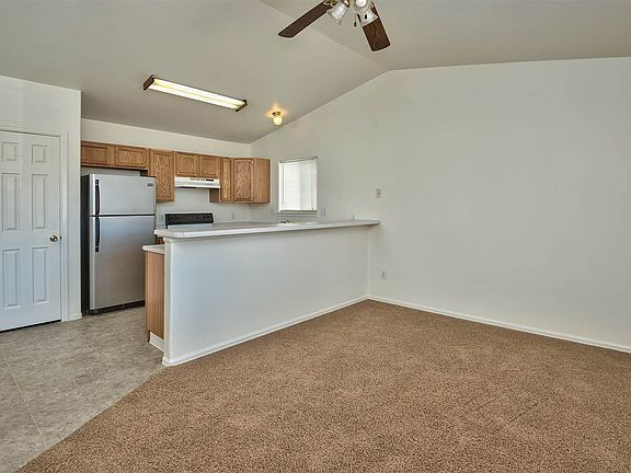 More builder details! This kitchen offers a doored pantry in addition to cabinet