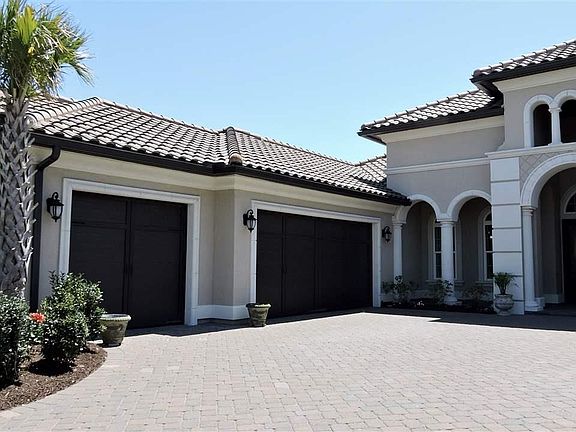 3 Car Garage & 2 Car Garage with Heat Pump - Epoxy Floor Coating - Utility Sinks - Service Doors