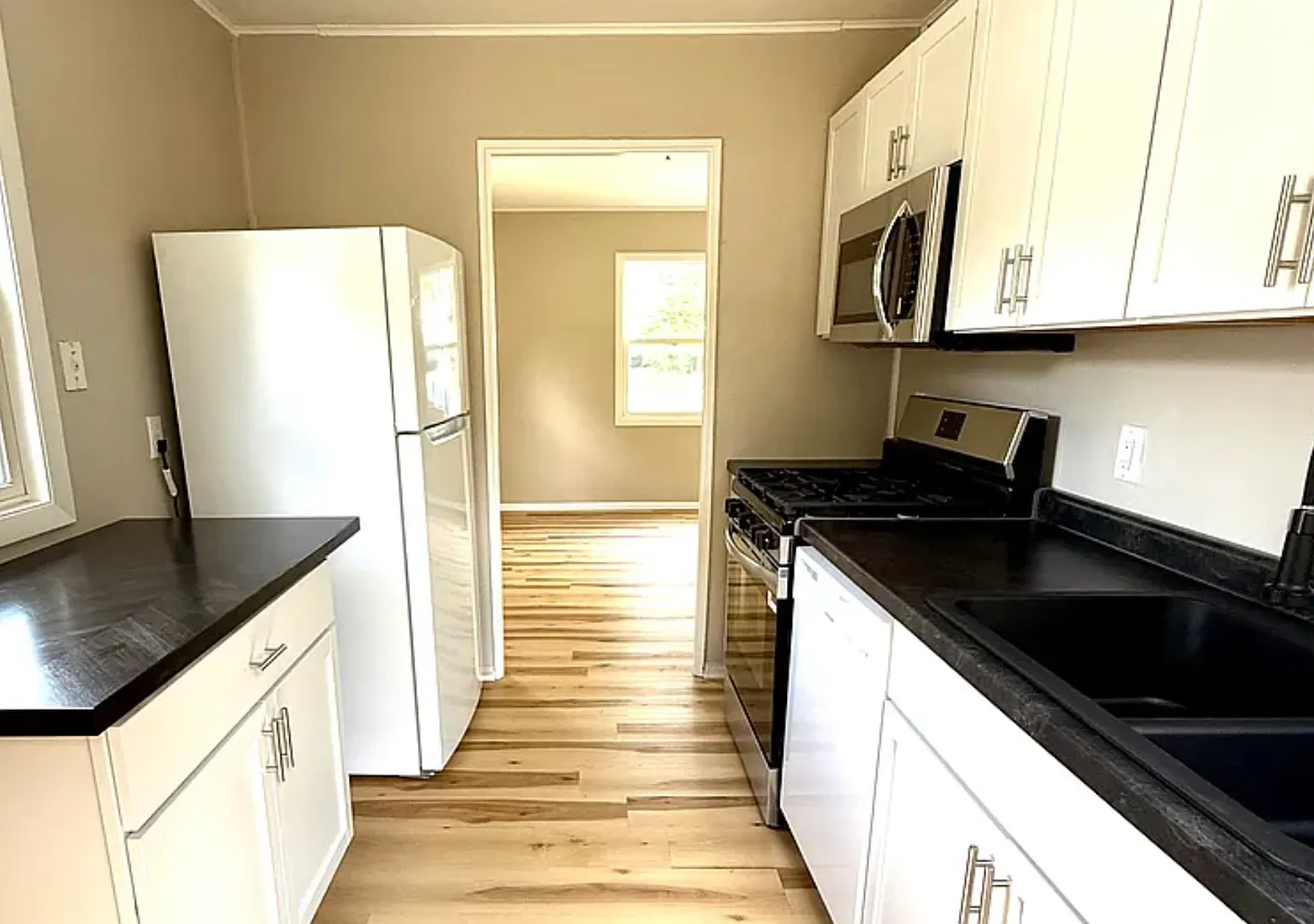 Sun-Filled 2BR Home on Corner Lot with Spacious Garage — Photo 3